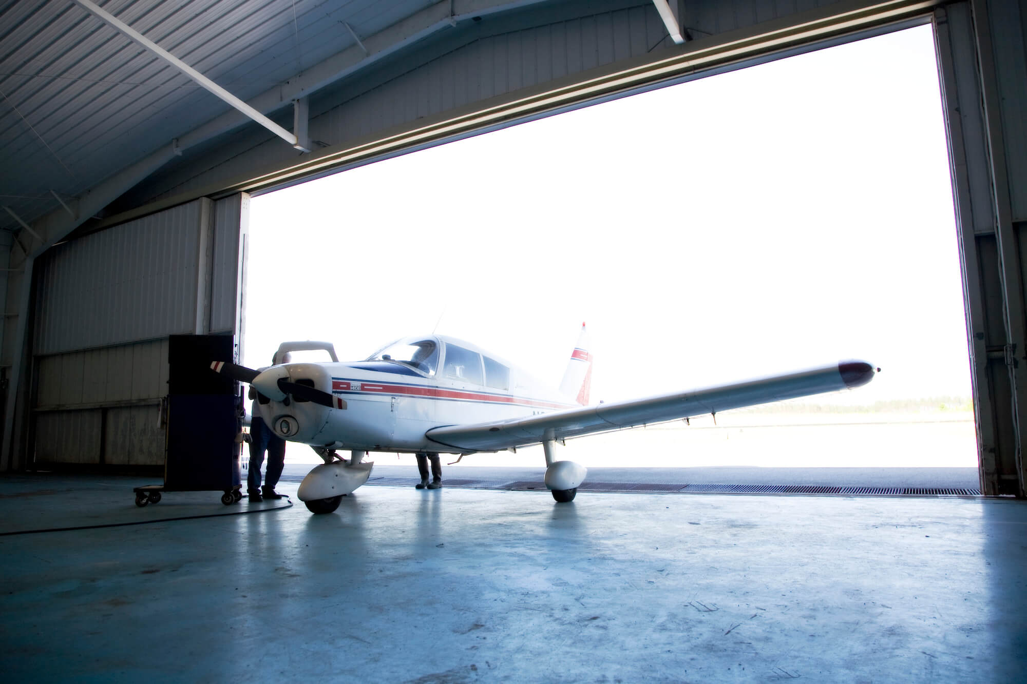 Small airplane in a hangar