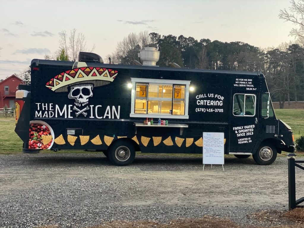 Food truck with The Mad Mexican logo painted on the side