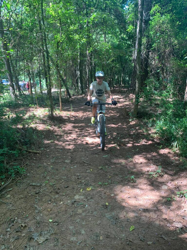 Canongate Nature Park with young cyclist