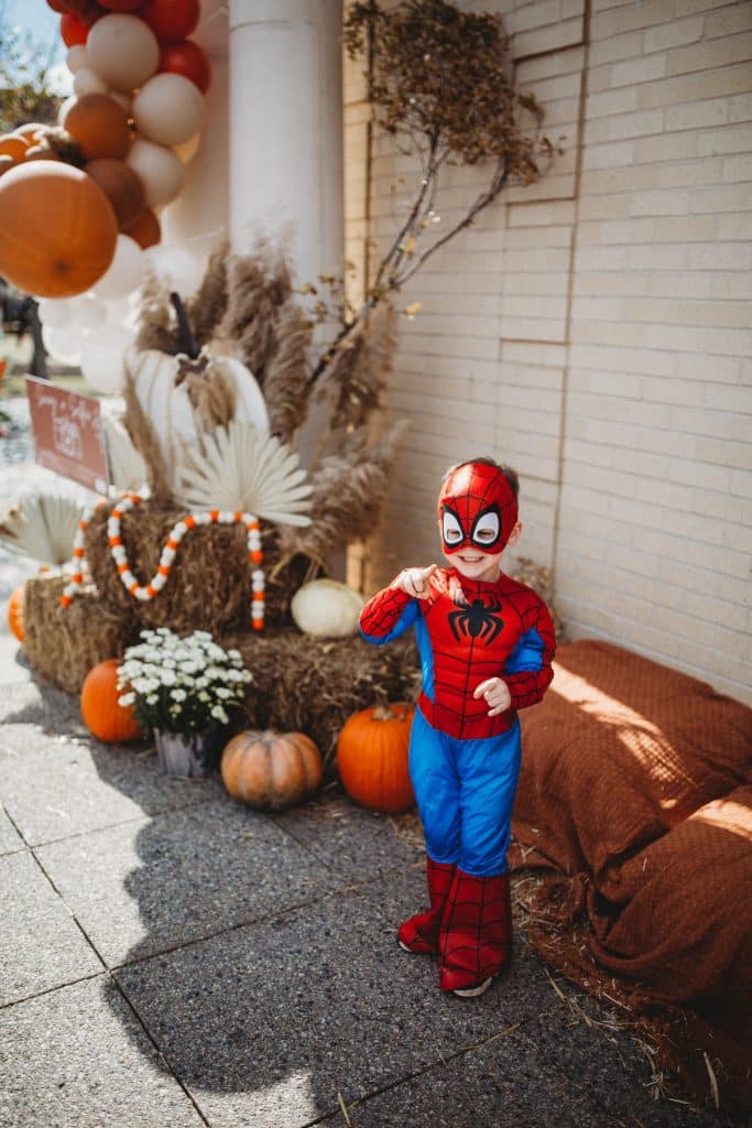 Child dressed in Spiderman costume